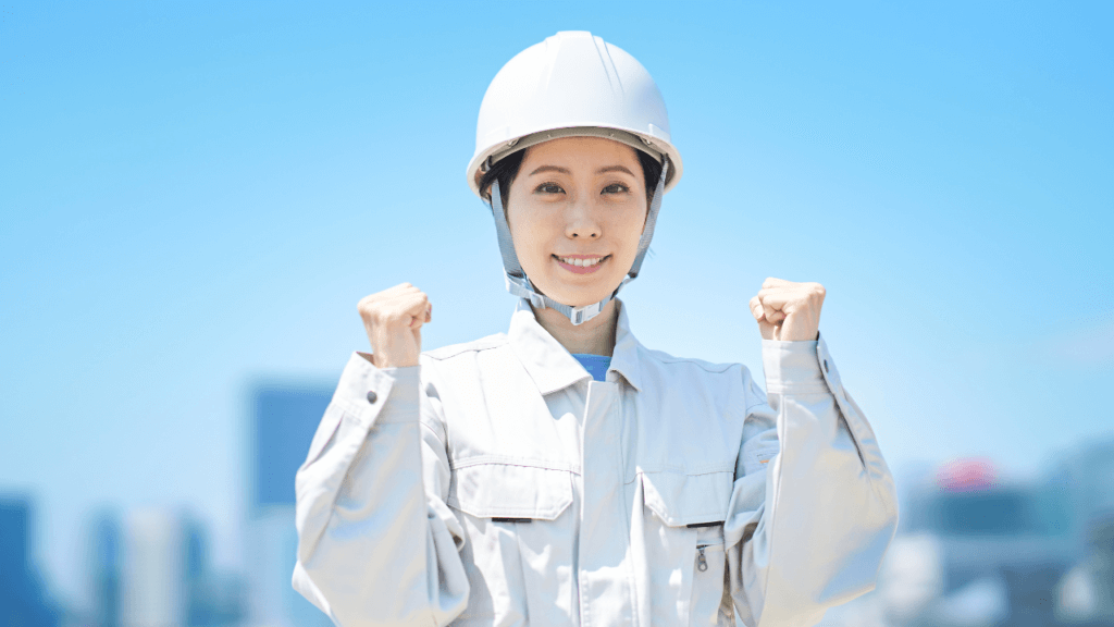 ガッツポーズの女性